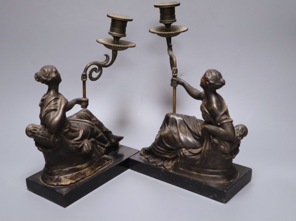 A pair of Regency bronzed plaster figural candlesticks, height 27cm